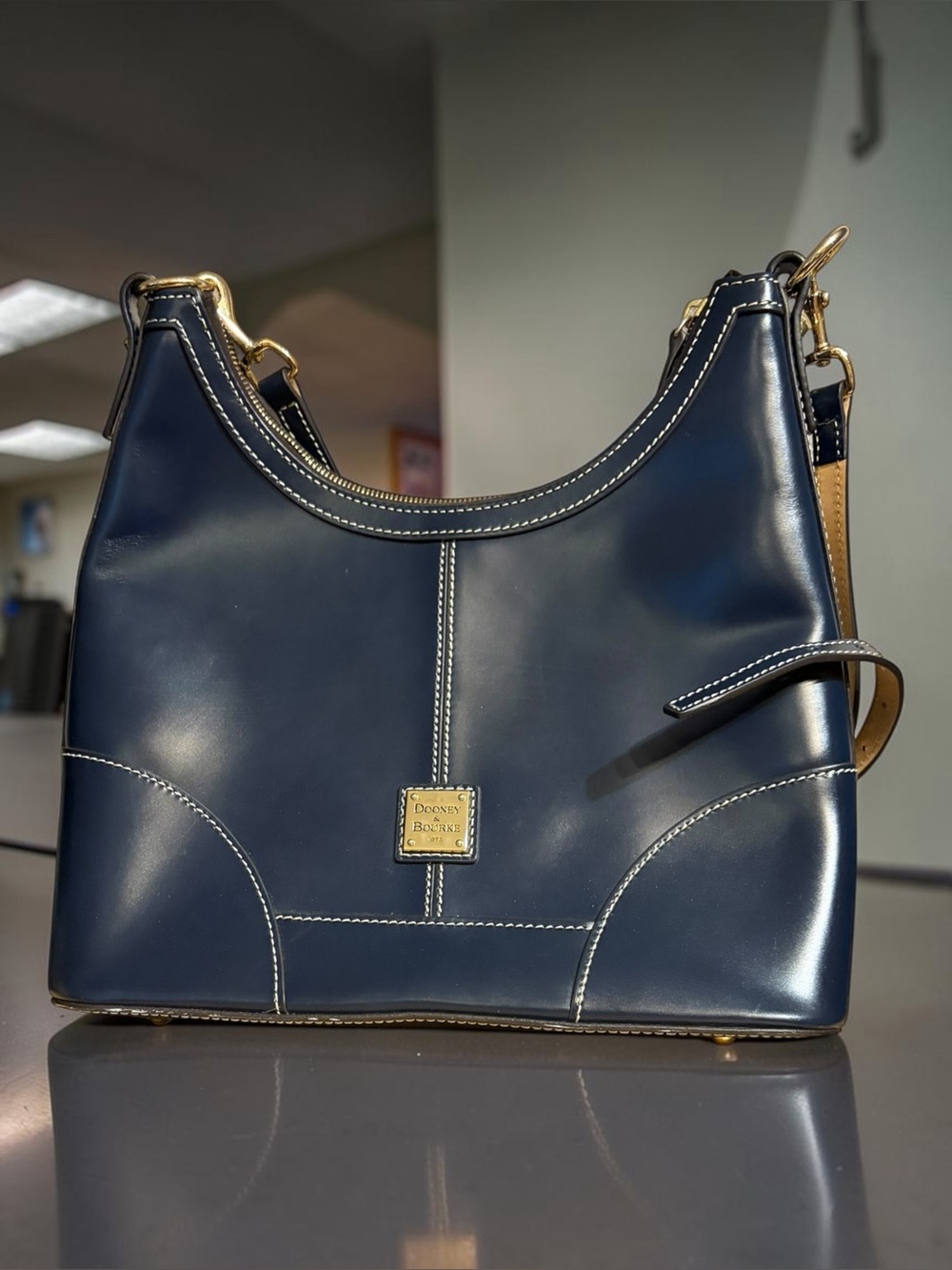 Dooney & Bourke Navy Leather Hobo with Tan Strap Accents